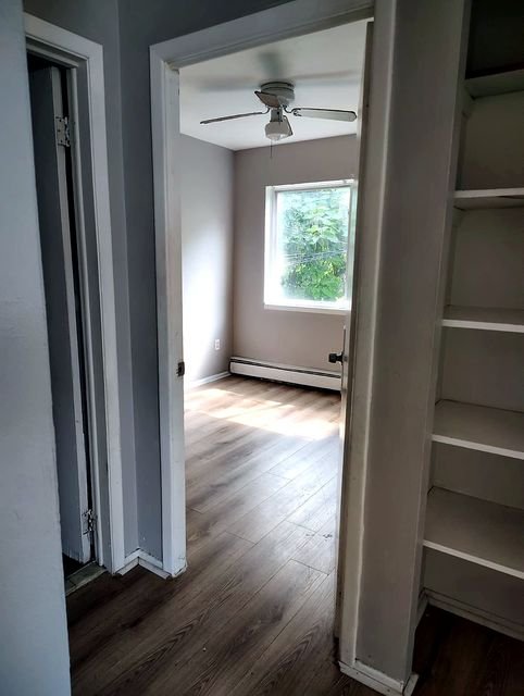 2 Bedroom Apartment at Allen House #208, Cleveland OH — Hallway with doorways and flooring visible.