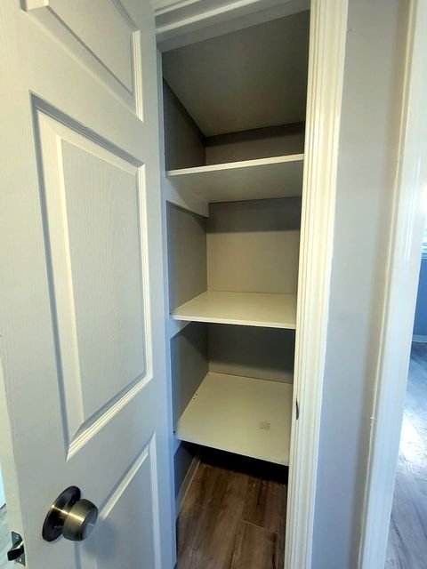 3 Bedroom Apartment at Dayton Apartments #1804 - Unit A, Dayton OH — Interior view of a closet with three shelves and a rod.