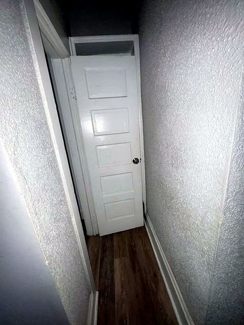1 Bedroom Apartment at Medellin #4, Cleveland OH — A hallway with a white door.